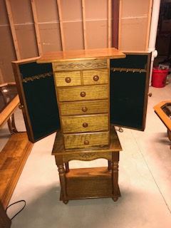 Jewelry Hutch with 5 drawers 2 side doors that open to store chains and necklaces $45