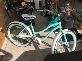 24 " Huffy coaster bike and helmet.  Bike comes with a basket in the front and a bell $100