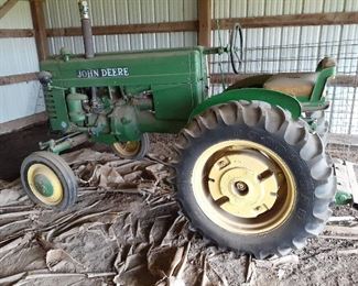 Antique John Deere Series M tractor. Restored and rebuilt engine. Runs great!