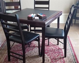 Upscale card table and chairs