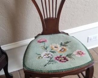 Feminine antique chair with needle point