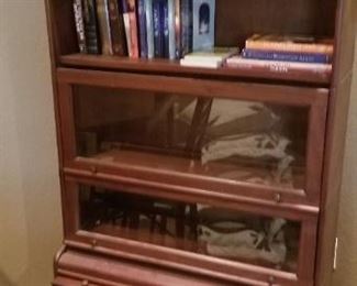 Lawyer's bookcase, top row has Lead Glass