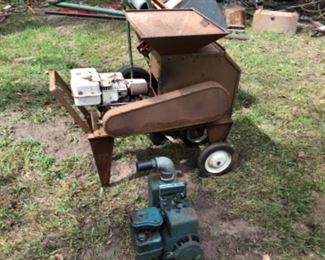 Vintage wood chipper and a water transfer pump.
