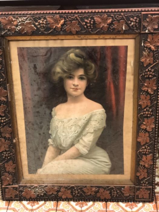 Lovely portrait in antique frame.