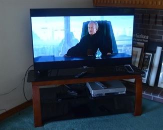 TV sold. Bluray player and TV stand available