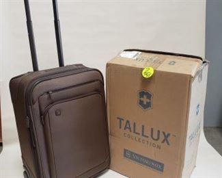 $65 - We have 35 PCS-Swiss Army Victorianox Rolling Carry On Luggage Brown/cafe color TALLUX - Retails for $225 (we have 35 of them available)