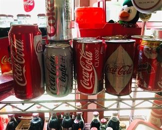 collection of coke cans(many more)
