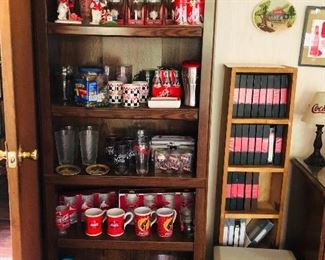 Shelf with Coca Cola collectibles/safe/