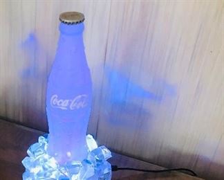 Vintage frosted coke on ice with LED lights.  Changes colors