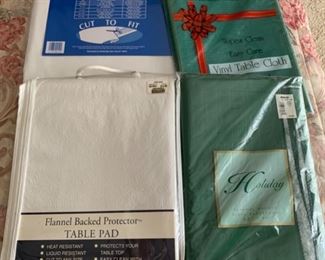 CLEARANCE!  $3.00 now, was $10.00......Table pads and Plastic tablecloths (P152)