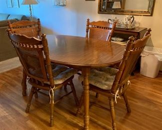 REDUCED!  $187.50 now, was $250.00.........Table and 4 Chairs with 2 leaves,  59” x 40”  leaves are 11” wide