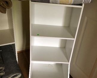 quilts and closet organizer shelf