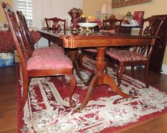 Dining Table with 6 chairs.  Rug