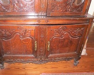 Massive Country French Oak China Cabinet with Heavy Carve Bouquet Crown Measures 96" tall, 56" wide and 21" deep