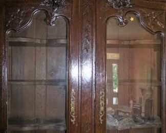 Massive Country French Oak China Cabinet with Heavy Carve Bouquet Crown Measures 96" tall, 56" wide and 21" deep