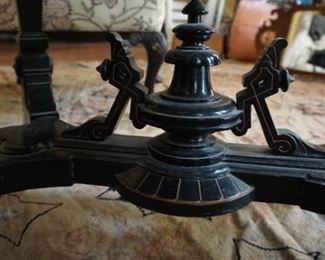 Renaissance Revival Ebonized and Gilded incised Center Table With Crown Motif
Measures 42” long, 26” deep and 31 tall
