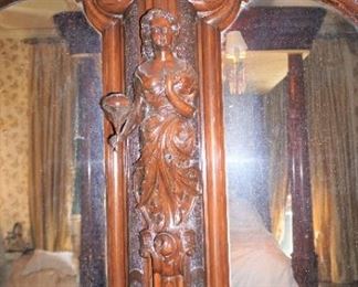 Monumental Heavily Carved Italian Baroque Mahogany Two Door Armoire with lower single drawer.  Solid Carved full body Italian Maiden, Open Pierced Carved Crown and Original Urn Finials. on Carved Feathered Feet  Measures 110" tall, 80" wide & 25" deep.
