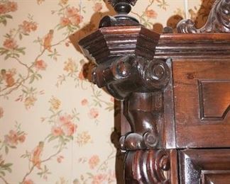 Monumental Heavily Carved Italian Baroque Mahogany Two Door Armoire with lower single drawer.  Solid Carved full body Italian Maiden, Open Pierced Carved Crown and Original Urn Finials. on Carved Feathered Feet  Measures 110" tall, 80" wide & 25" deep.