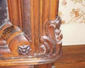 Monumental Heavily Carved Italian Baroque Mahogany Two Door Armoire with lower single drawer.  Solid Carved full body Italian Maiden, Open Pierced Carved Crown and Original Urn Finials. on Carved Feathered Feet  Measures 110" tall, 80" wide & 25" deep.