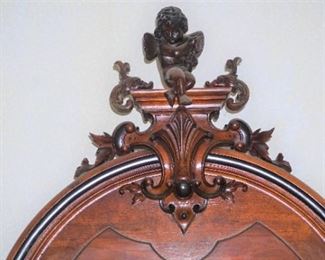 1840 Antique Walnut Victorian full Bed Angel Heavily Carved Paneled Curved Foot Board with Scroll Top With Angels Carved atop the headboard.