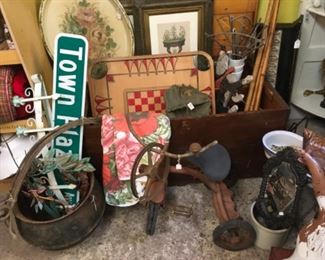 More trunks, trays, cast iron pot and rusty trike. 