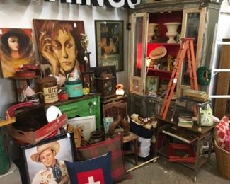 Gray hutch, green table, pillows