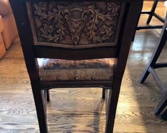 Check out the detail on the back of these stools