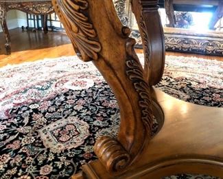 Four post pedestal base on dining table