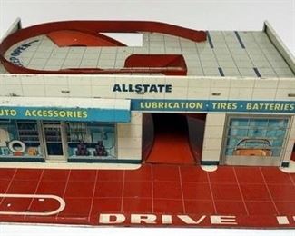 1004	SEARS ALLSTATE TIN GAS STATION TOY GARAGE, NOT COMPLETE
