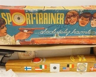 1011	CHILDS VINTAGE TIN TOY SHOOTING GAME IN BOX, 32 IN LONG
