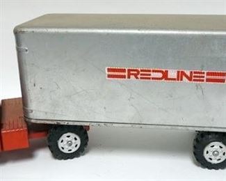 1023	VINTAGE MARX LARGE SCALE TRACTOR AND TRAILER
