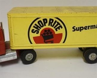 1032	TOY SHOPRITE PRESSED STEEL ERTL TRACTOR TRAILER, 22 IN LONG.
