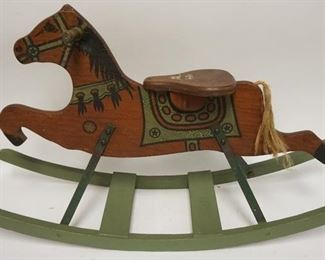 1043	CHILDS WOODEN ROCKING HORSE
