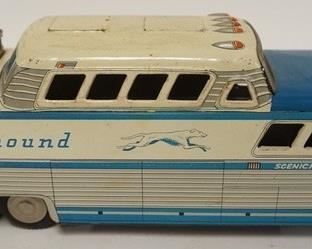 1051	ANTIQUE TIN TOY GREYHOUND FRICTION BUS, 11 1/2 IN LONG
