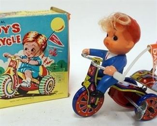 1068	VINTAGE BOY TOY WINDUP TRICYCLE IN BOX
