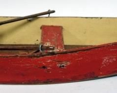 1069	WOOD TOY ROW BOAT WITH OARS
