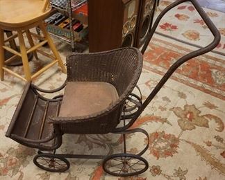 1298 ANTIQUE WICKER STROLLER 
