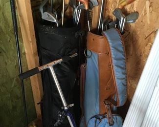 . . . two pair of golf clubs and a scooter