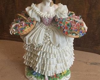 Stunning Dresden lady with lace petticoat and baskets of flowers. 