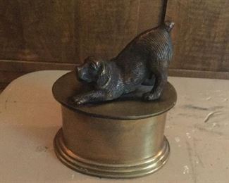 Antique oval brass box with bronze crouching puppy on lid. 