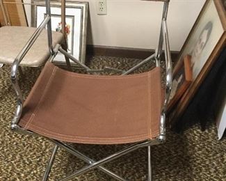 Canvas and chrome Mid Century Modern folding chair. 
