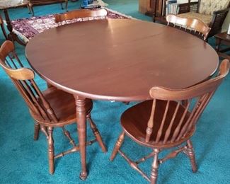 Round Table with 1 leaf and Four Chairs - good condition. 
