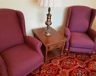 Wonderful Berry Tone Recliners. Side Table. Brass Lamp