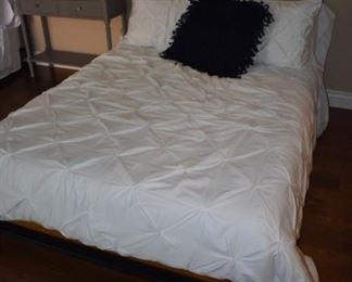 Full size bed mattress is Tempurpedic wanna be.