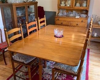 Gate leg dining table and 6 rush seat ladder back chairs, china cabinets, silver chest, tons of glassware....