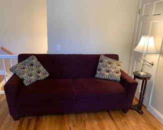Purple sofa in Bonus Room