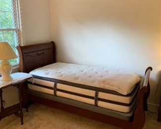 Twin bed with very new Sealy mattress