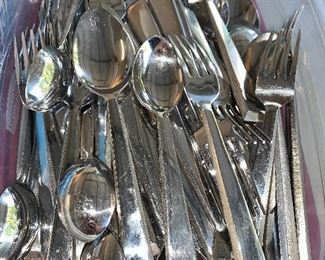 One of three sets of stainless flatware