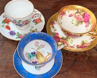 Many cup and saucer sets