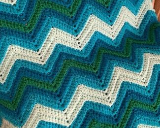 many afghans and other knitted and crochet items